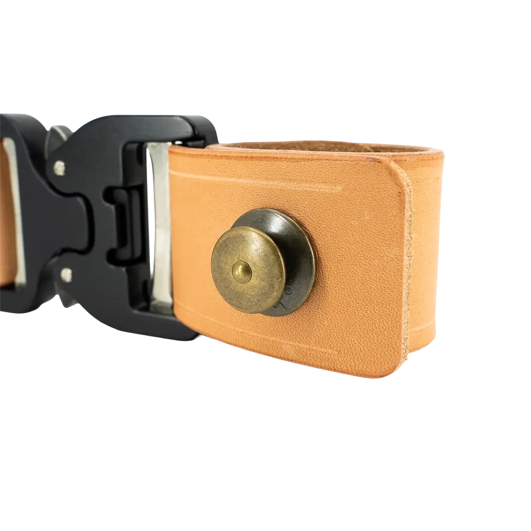 Detail of a Box Light Rig with COBRA buckle in natural leather with brass hardware