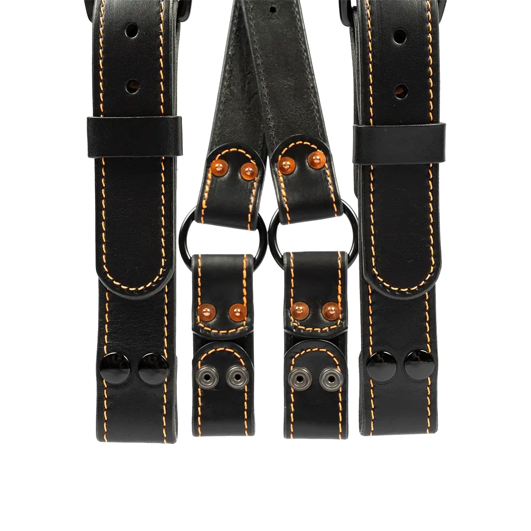Bottom strap detail showing snaps connection and craftsmanship of leather suspenders