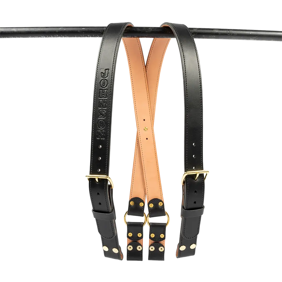 Crossed leather suspenders with vegetable tanned lining. Highlighting premium stitching and durable design