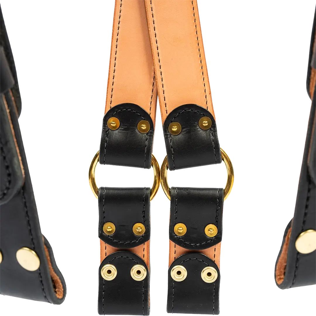 Dual-tone leather firefighter suspenders with brass hardware and natural leather backing