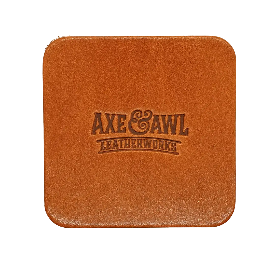 Square Leather Coaster in q tan leather with word mark logo