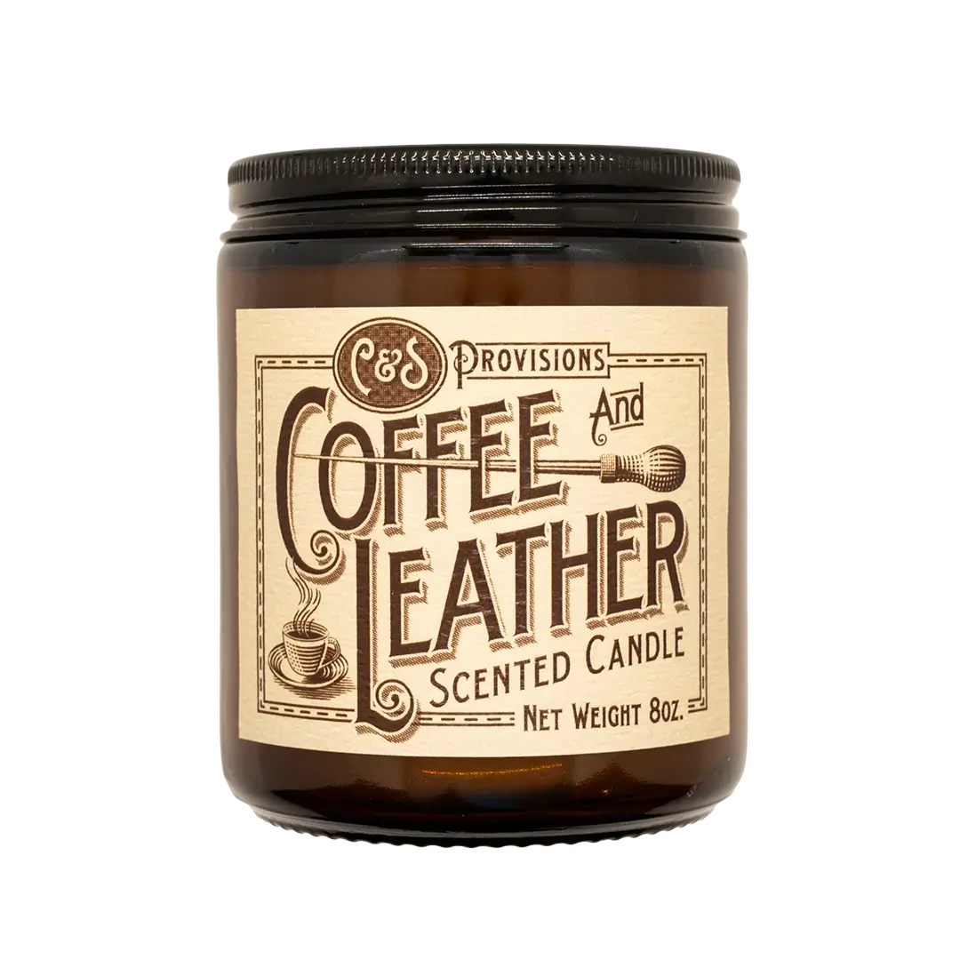 C&S Provisions Coffee & Leather scented candle with lid secured on amber glass jar