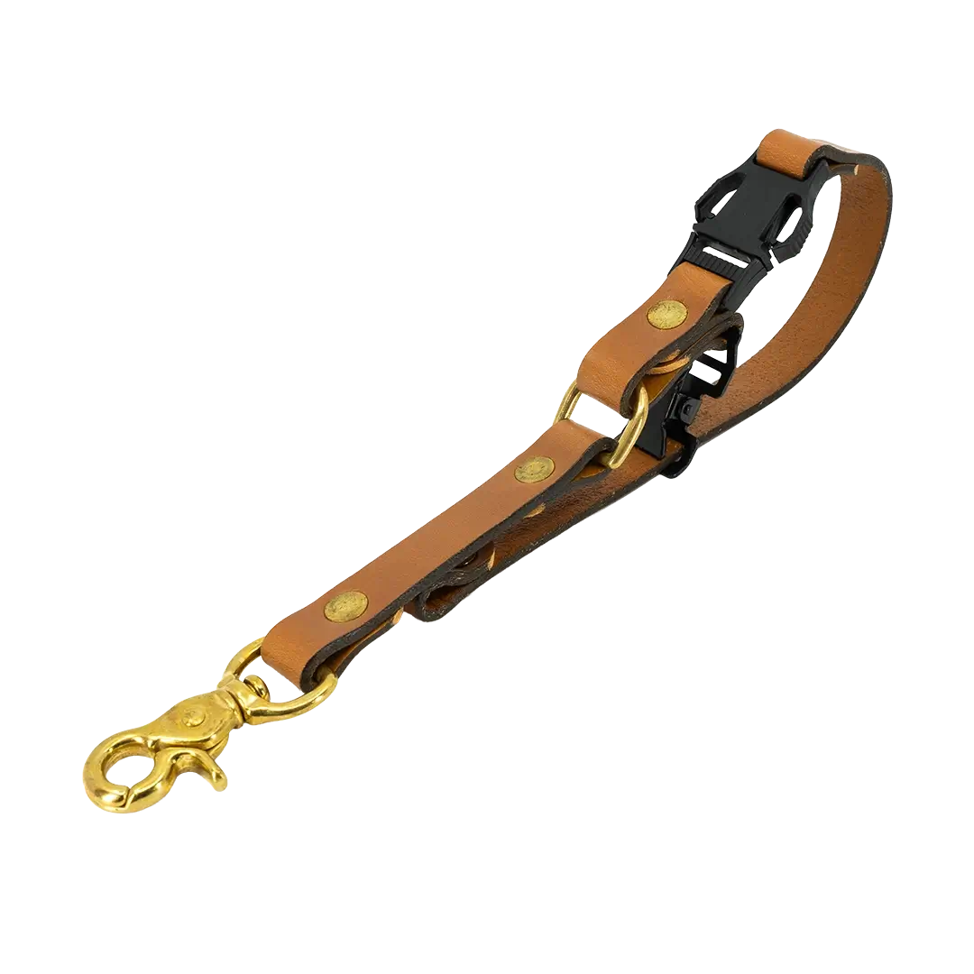 Fully opened view of tan firefighter glove strap with extended length and hardware layout.