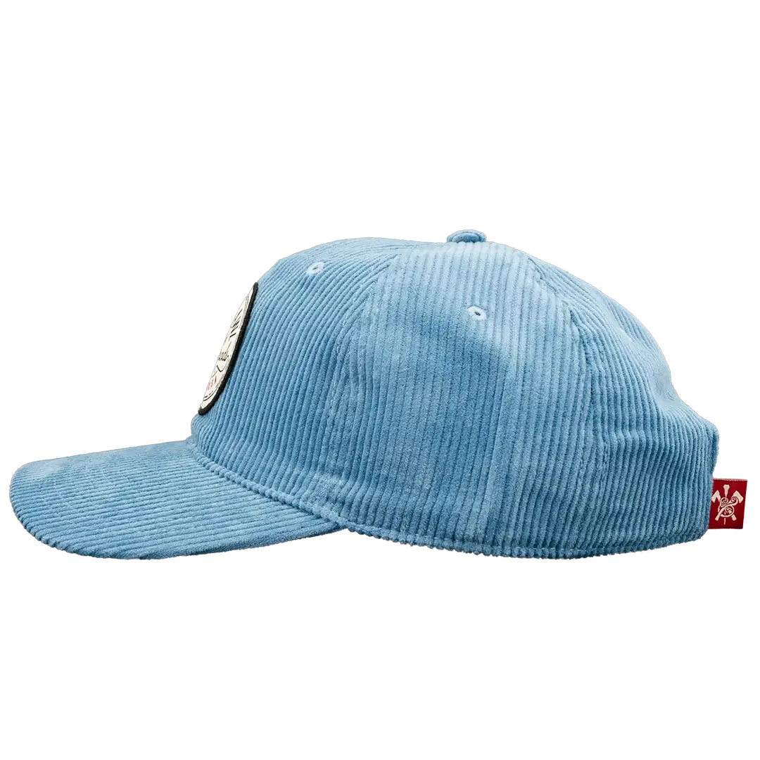 Side view of blue corduroy durable goods hat