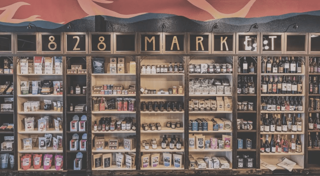 828 markets stock of local items on shelves in their brick and mortar sporting several items from local small businesses