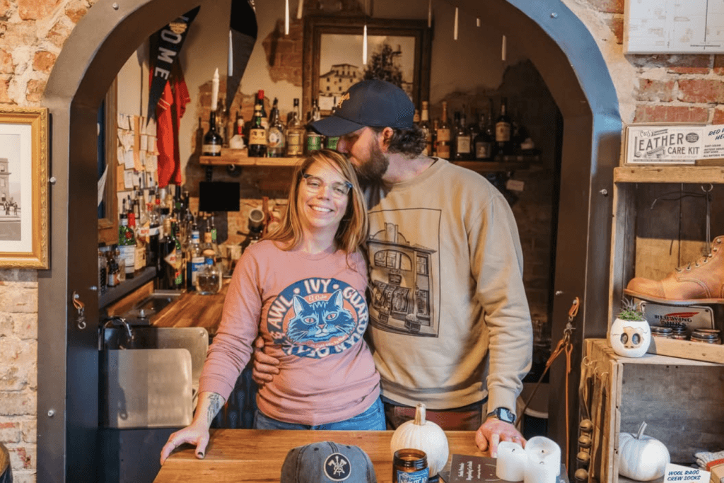 Owners of Axe and Awl Leatherworks and Bevel Bar Courtney and Spencer Tetrault behind the first rendition of Bevel Bar