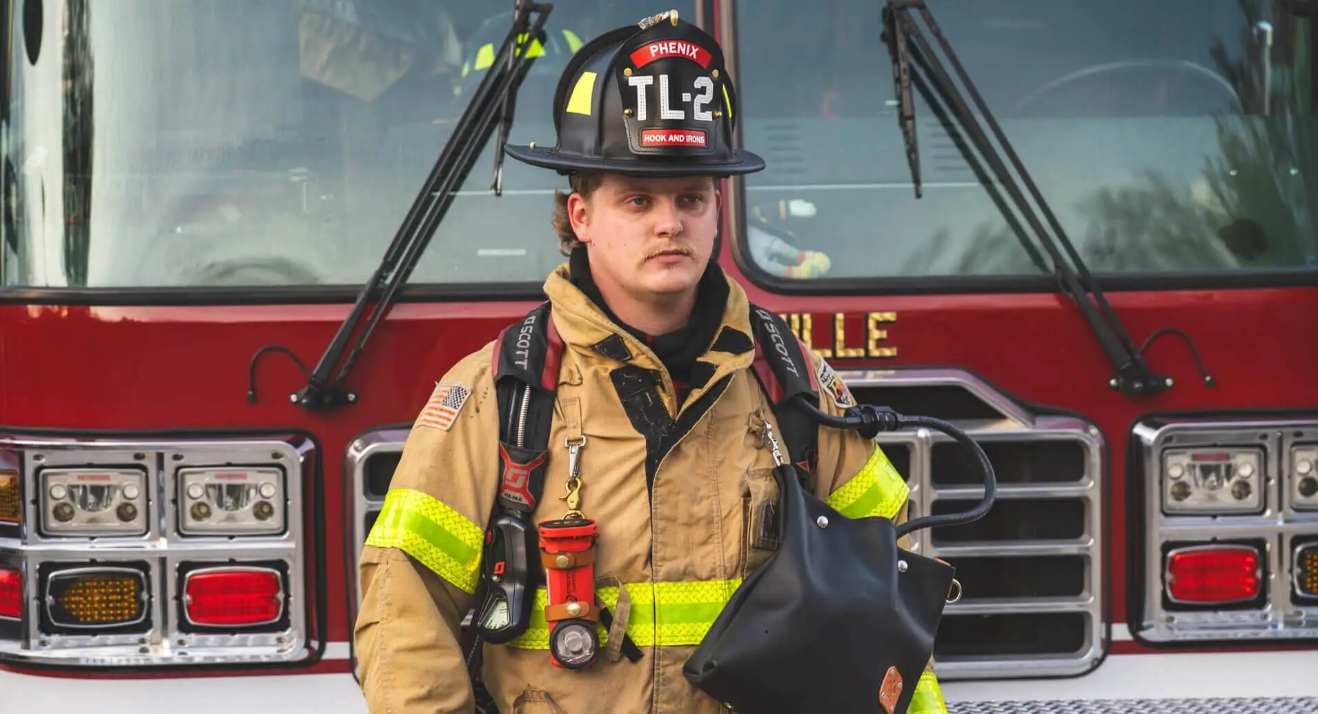 Firefighter Wearing Axe and Awl leather gear