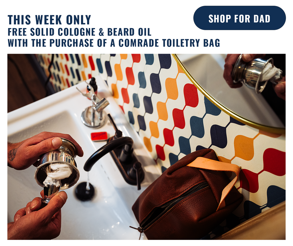 a leather comrade toiletry bag advertising a bundle for father's day that includes a free solid cologne and beard oil