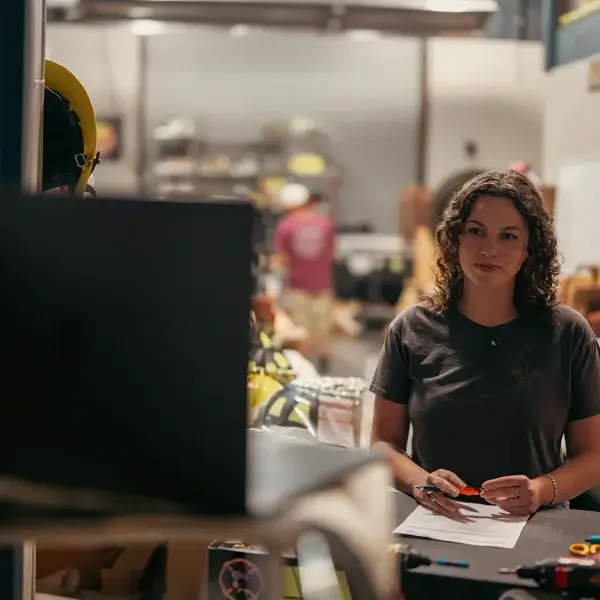 axe and awl team member natalie on a video consultation for a custom phenix helmet order