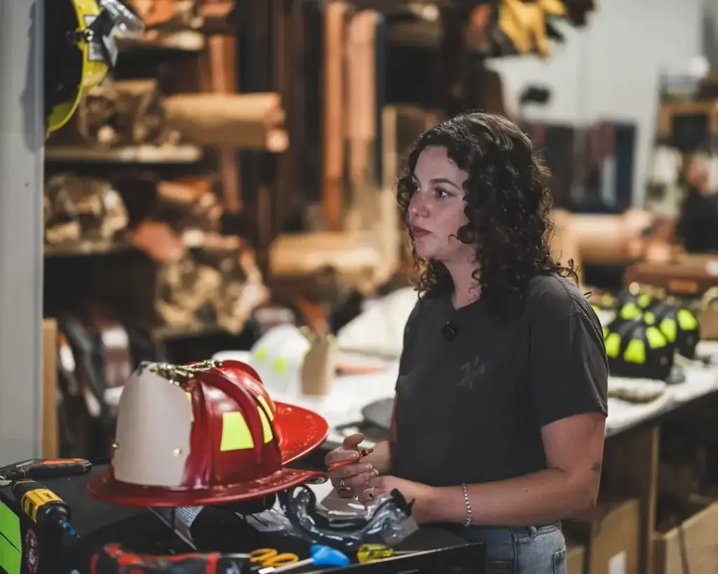 axe and awl team member natalie on a phenix custom order video consultation showing a scarlet read bronx bend tl-2 and fire red boston bend tl-2