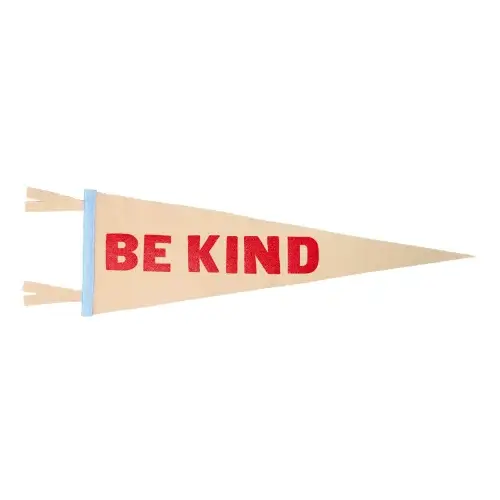A sand colored Oxford Pennant that says Be Kind in Red